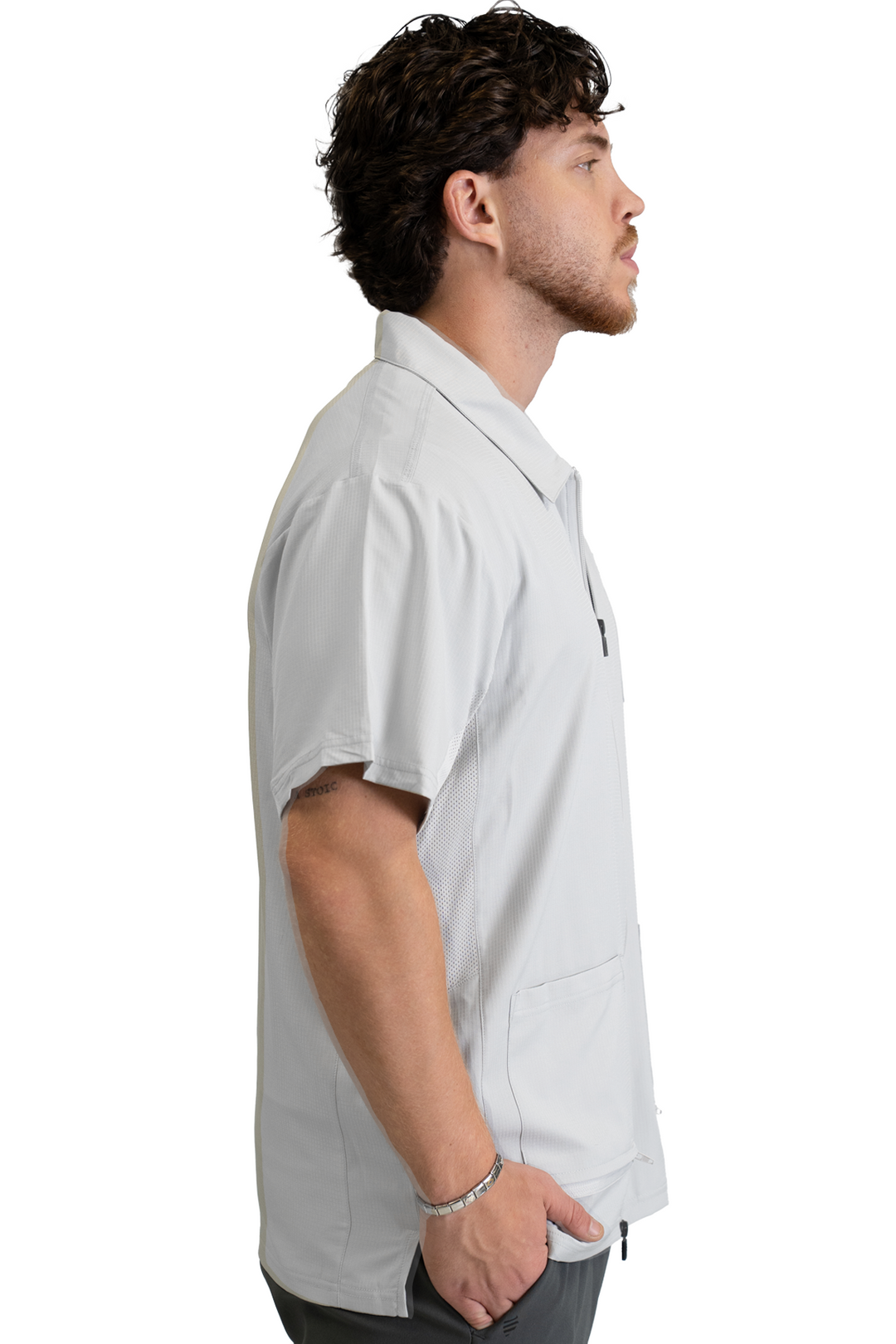 The Barber Jacket in Cool Gray, side view showing the mesh side panel